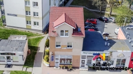 Budynek z dwupoziomowym mieszkaniem i lokalem